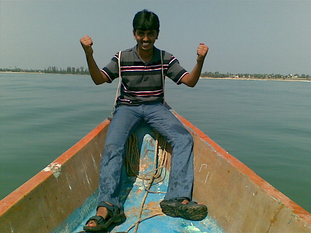 Me - sitting on the boat's edge