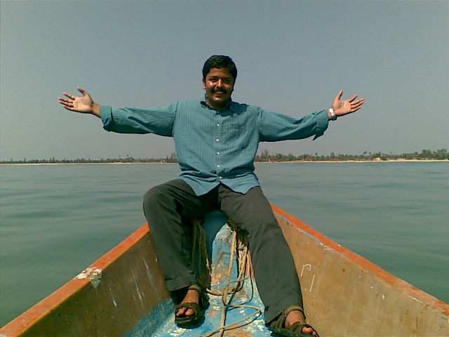 Arvindh - Posing from boat's edge