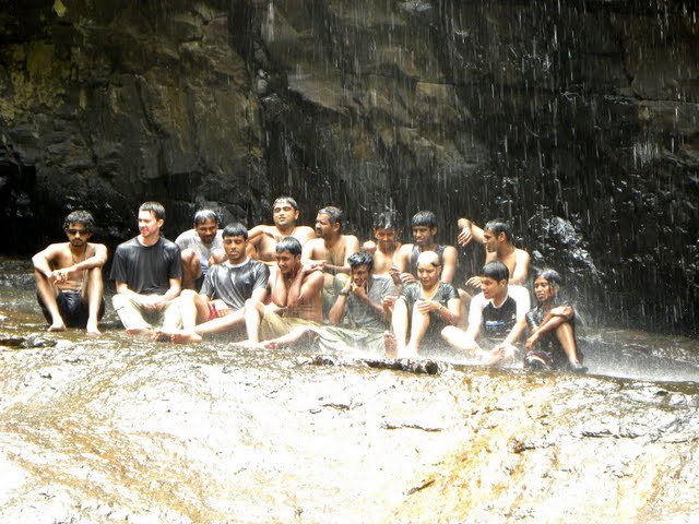 Group Photo Under the Falls